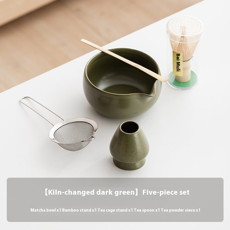 Kumora Ritual Kit contents — dark green spouted matcha bowl, bamboo chasen whisk, scoop, sifter and ceramic whisk stand